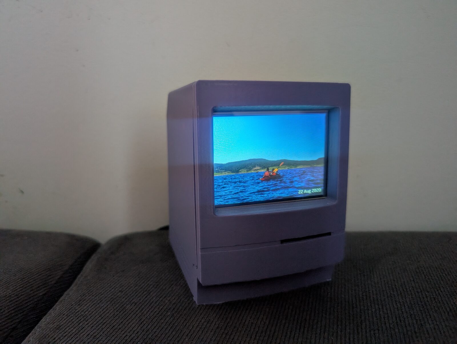 The frame showing a photo from Immich